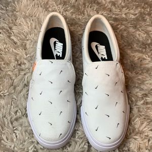 White nike slip on shoes, size 8.5